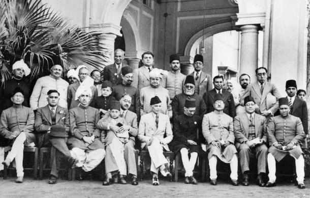 Muslim League leaders after a dinner party given at the residence of Mian Bashir Ahmad, Lahore, 1940. Group portrait with Jinnah seated in the centre. (British Library)